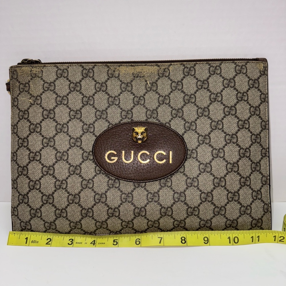 GUCCI Neo Vintage GG Supreme coated canvas wristlet pouch with tiger head plaque